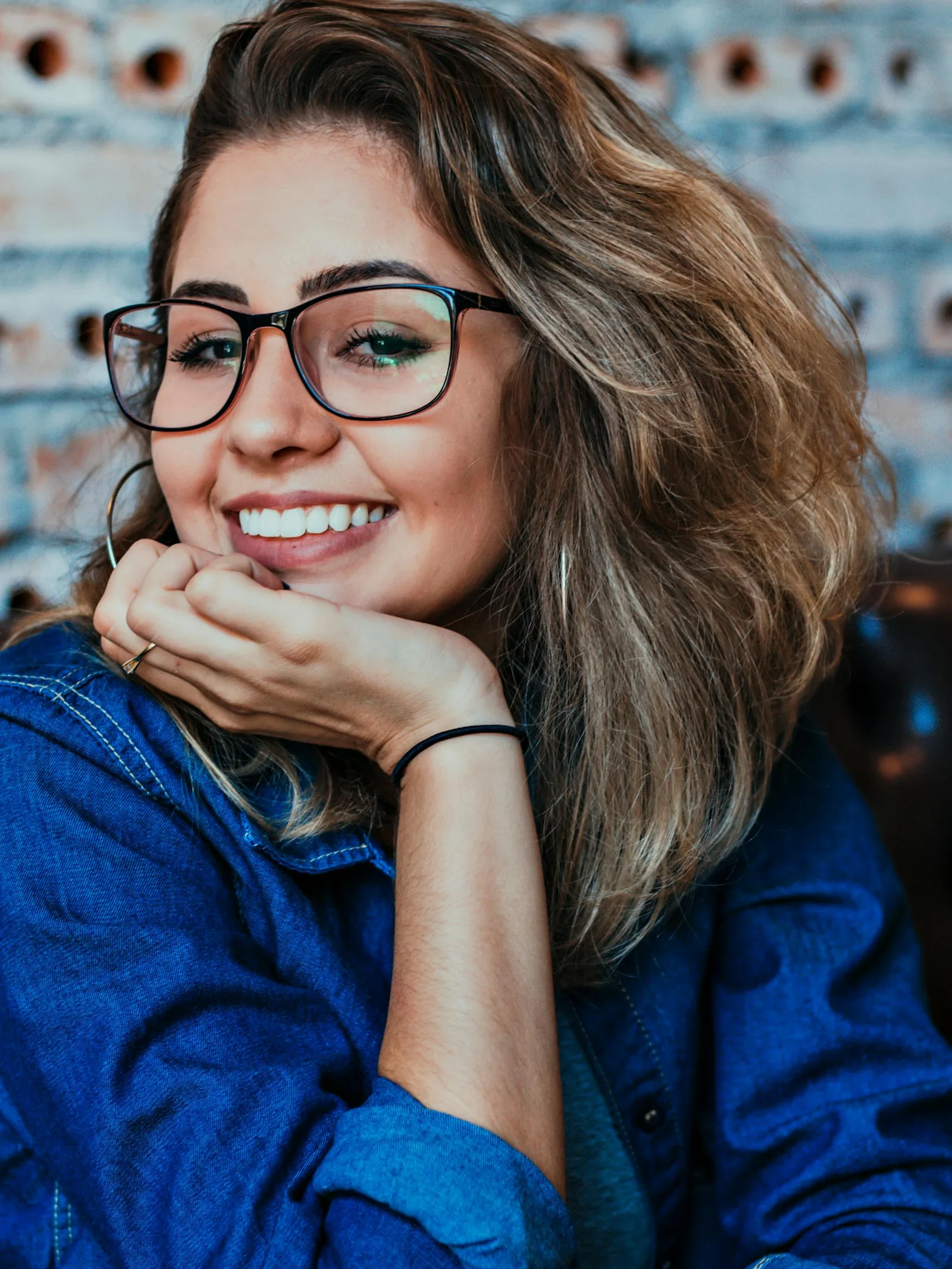 Happy patient with bright healthy smile at Enlighten Dental Vancouver