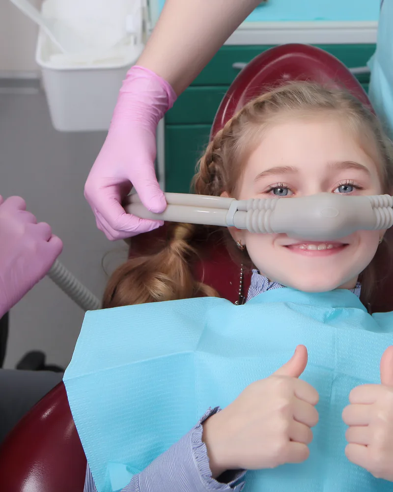 Dentist providing comfortable sedation dentistry care